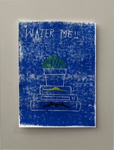 Picture of an Art Piece with a stack of book with a plant on top on a blue background.